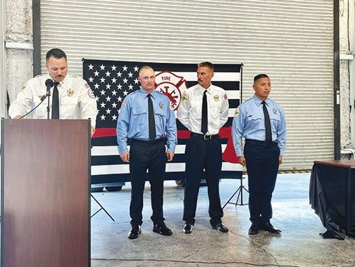 LaBelle Fire Department Chief Brent Stevens (left) awards firefighters (left to right) Alex Martin, Logan Mungillo and Jose Juarez the Act of Bravery Award.